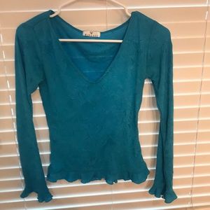 Turquoise shirt with ruffle sleeves and bottom